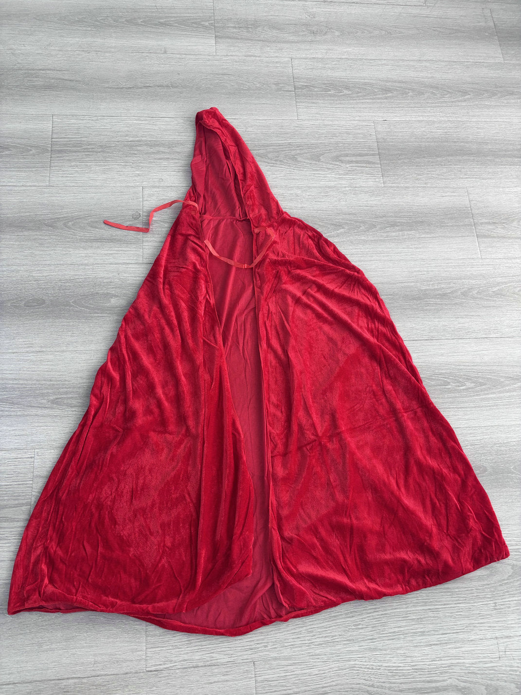 Full-length red hooded cape included with the Red Riding Hood costume