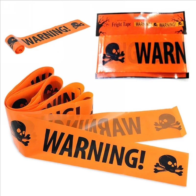 Orange Halloween warning tape with skulls across a doorway