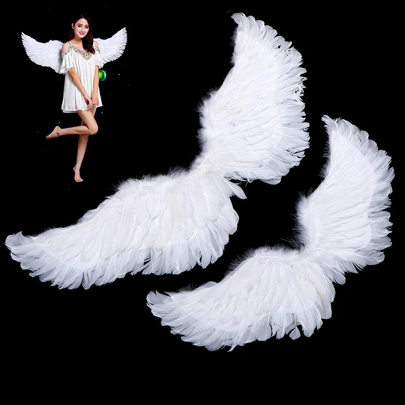 White feather angel wings worn with elastic straps