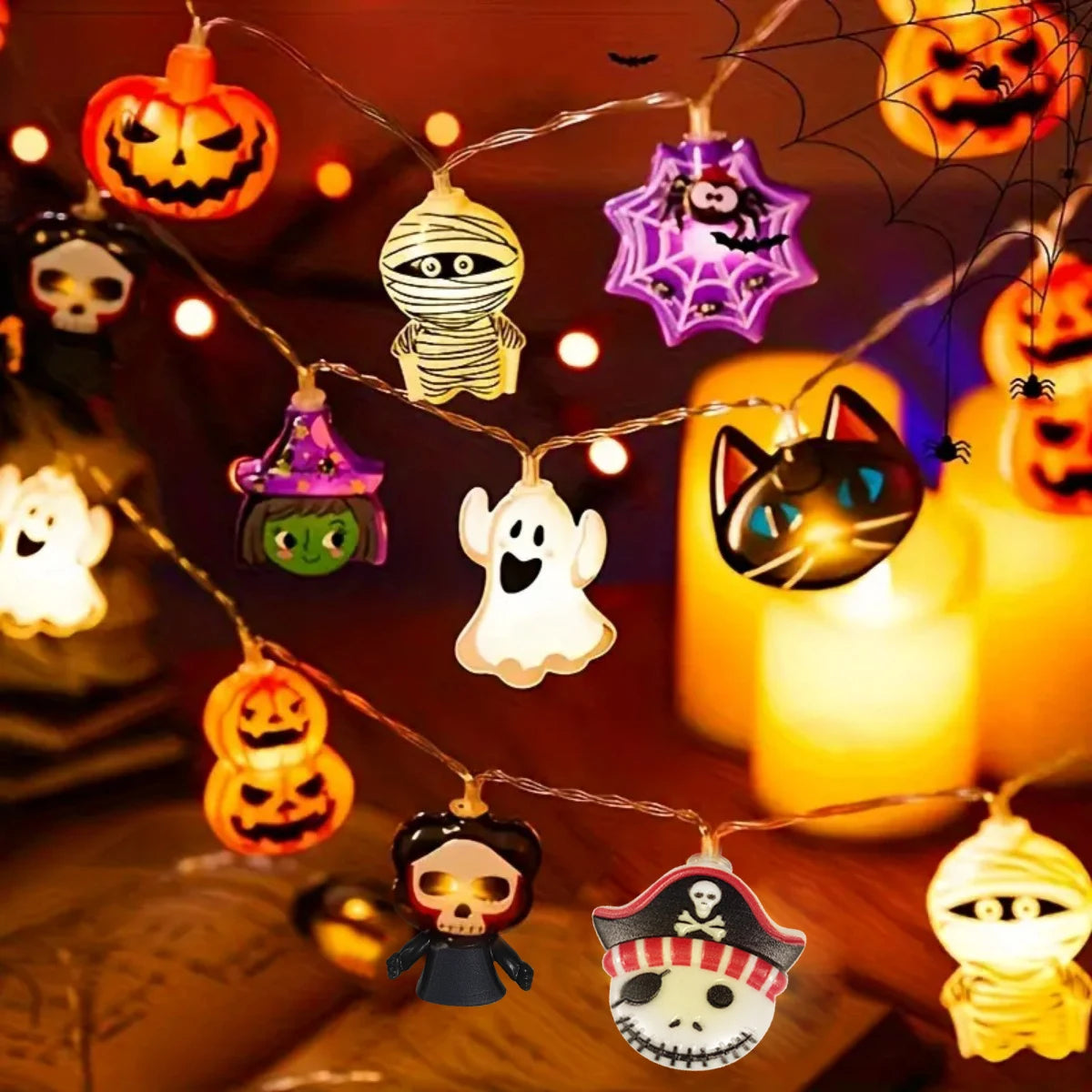 Halloween character string lights with ghosts, witches, cats and pumpkins lit
