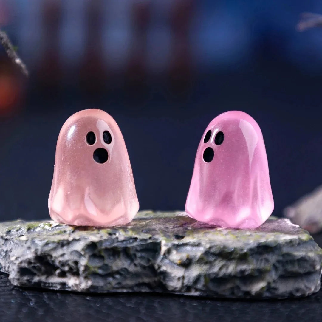 Ghost figures in a hand for size